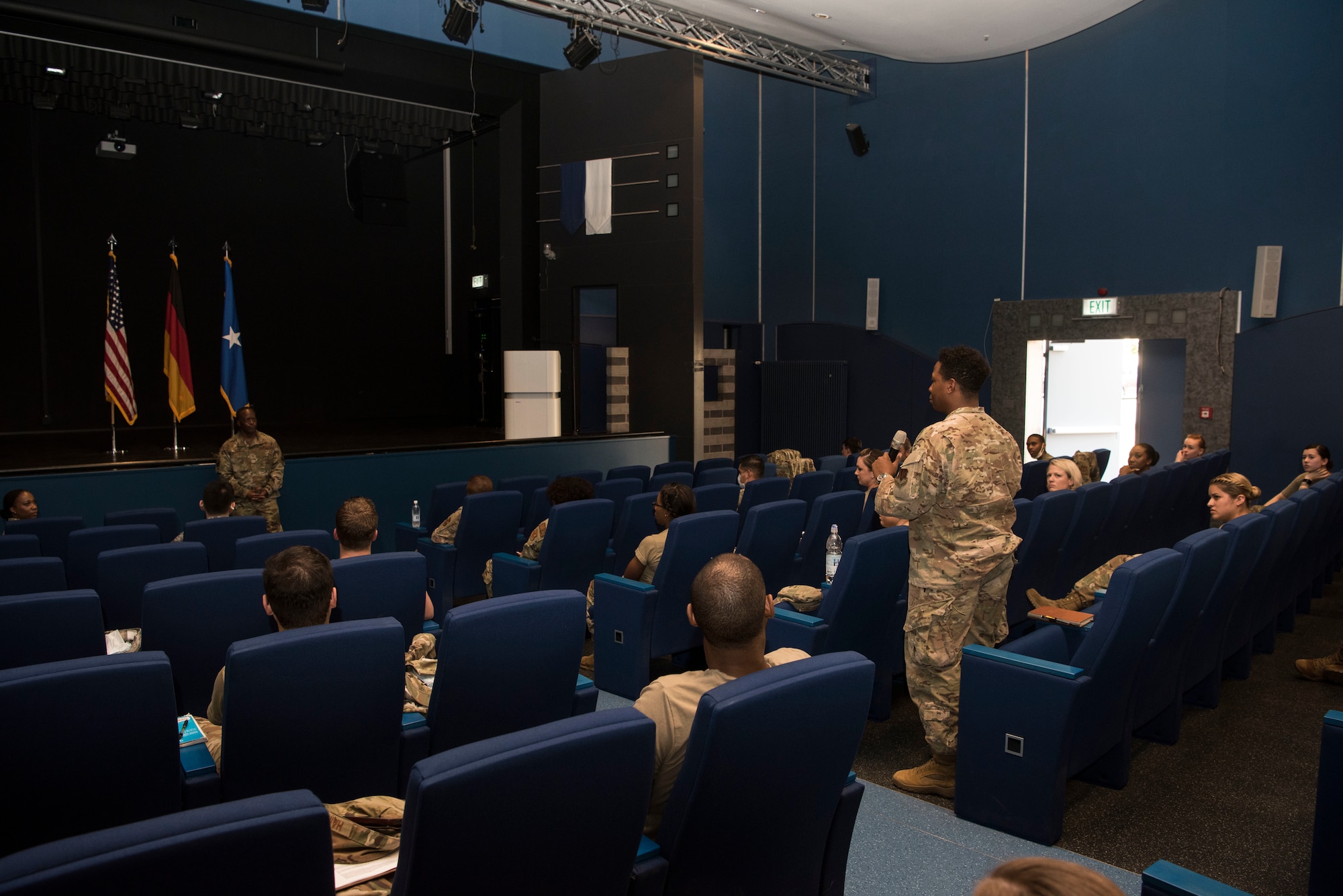 U.S. Air Force 2nd Lt. Rodney Jones Jr., 24th Intelligence Squadron distributed common ground system training flight commander, asks a question to Brig. Gen. Ronald E. Jolly, Headquarters U.S. Air Forces in Europe – Air Forces Africa engineering and force protection director of logistics, during a forum.