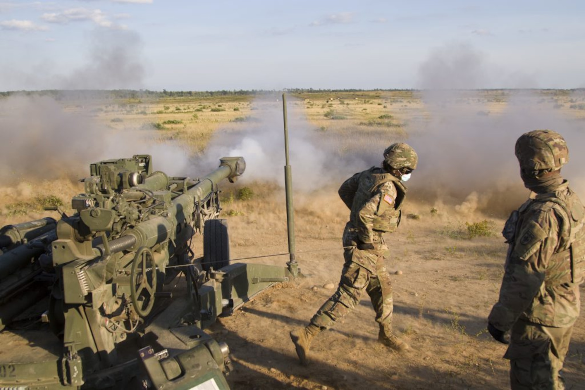 A U.S. Army Soldiers assigned to Bravo Battery, 1st Battalion, 119th Field Artillery Regiment, Michigan Army National Guard, fires a M777 155mm howitzer as part of a direct fire training exercise during Northern Strike 20, Camp Grayling, Michigan, July 25, 2020. The National All Domain Warfighting center in Northern Michigan, of which Camp Graying is a part, is the premier location to replicate the future operating environment, benefiting military readiness. (U.S. Army photo by Sgt. Adam Parent)
