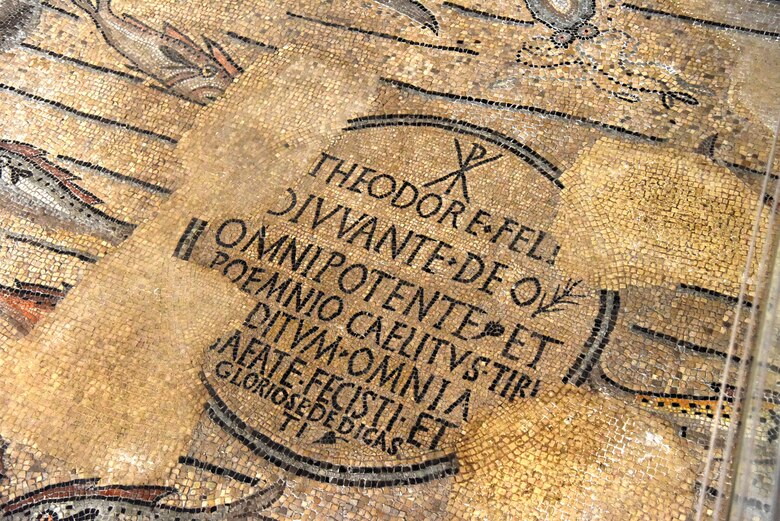 Inscription mosaic at Aquileia, Italy, July 25, 2020. This inscription is celebrating the constructor of the building, Bishop Theodore. (U.S. Air Force photo by Staff Sgt. Kelsey Tucker)