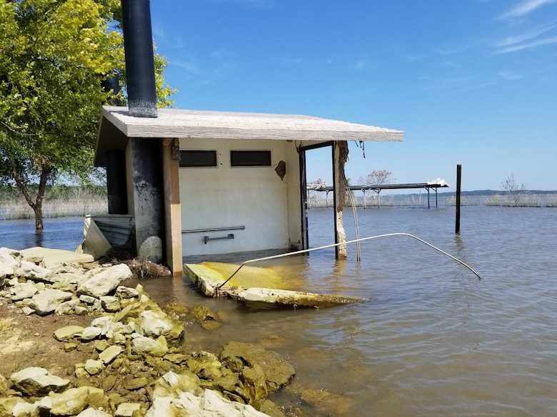 2019 flood waters pounded Tuttle Cove facilities for roughly 7 months – taking their toll on roads, buildings, and campsites.  Repairs will allow park areas to be reopened to the public for the 2021 summer season.