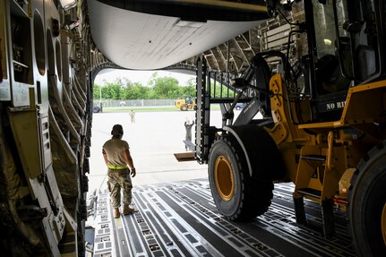 A U.S. Air Force C-17 Globemaster III cargo airplane with the 176th Wing, Alaska Air National Guard, arrives at the 156th Wing, Muñiz Air National Guard Base, Aug. 7, 2020, delivering Disaster Relief Beddown System equipment to the Puerto Rico Air National Guard. The DRBS from the 119th Wing, North Dakota ANG, is one of two systems that the PRANG is receiving to provide needed support to first responders after a natural disaster.