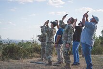 U.S. Army personnel take photos of a B-52H Stratofortress from Barksdale Air Force Base, La., during Exercise Pegasus Forge at Fort Hood, Texas, Aug. 11, 2020. The event took 45 days in the field leading up to the last full day filled with a fires coordination exercise. (U.S. Air Force photo by Senior Airman Lillian Miller)