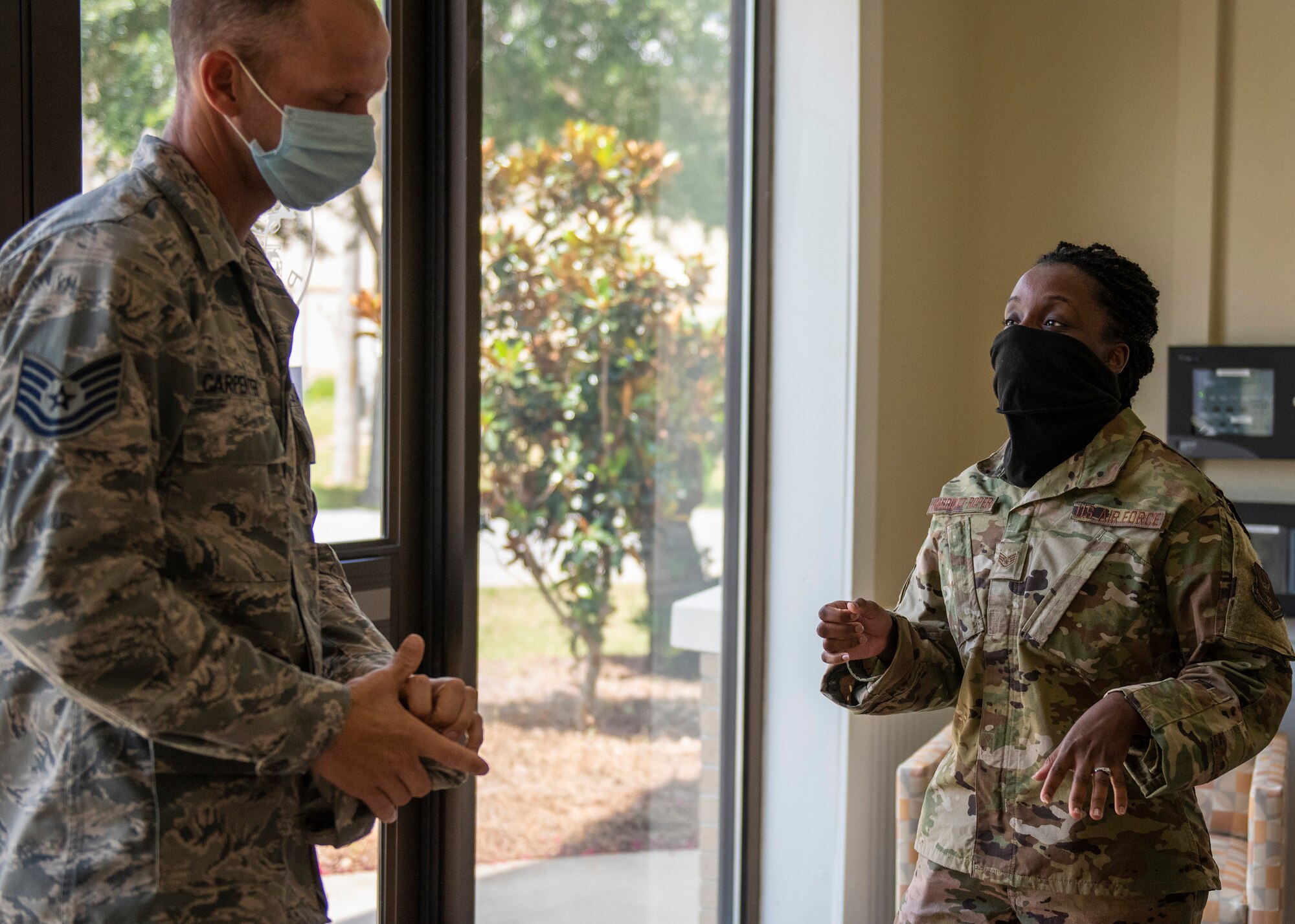 photo of two Airmen talking