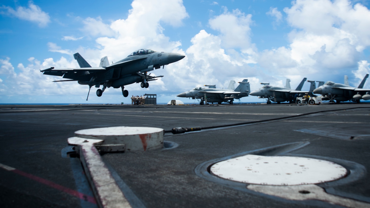 200814-N- KP021-0245 SOUTH CHINA SEA (August 14, 2020) An F/A-18F assigned to the “Diamondbacks” of Strike Fighter Squadron (VFA) 102 lands on the flight deck of America’s only forward-deployed aircraft carrier USS Ronald Reagan (CVN 76)  while conducting operations in the South China Sea. Ronald Reagan, the flagship of Carrier Strike Group 5, provides a combat-ready force that protects and defends the United States, as well the collective maritime interests of its allies and partners in the Indo-Pacific region. (U.S. Navy photo by Mass Communication Specialist 2nd Class Codie L. Soule)
