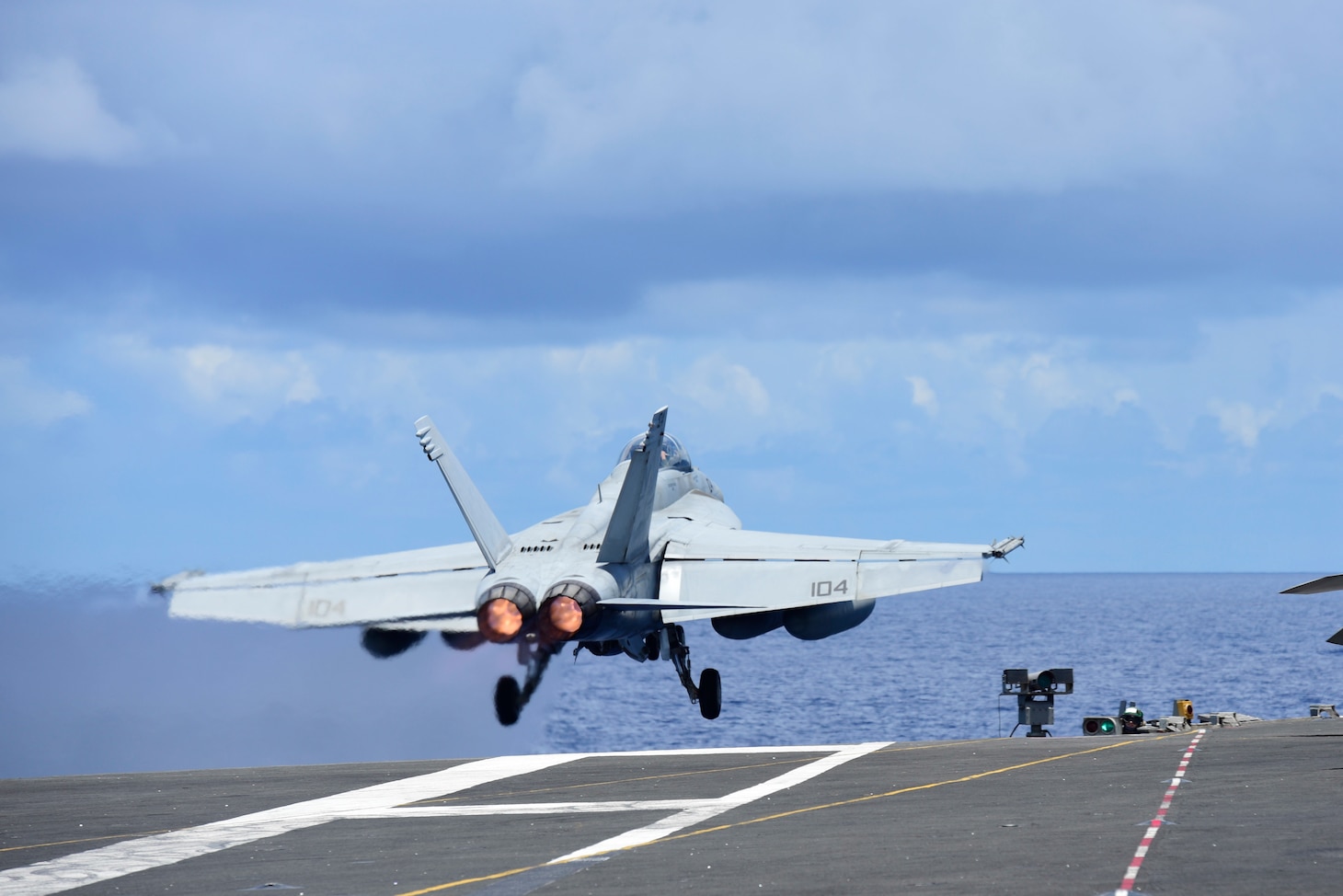 200814-N-RF825-1025 SOUTH CHINA SEA (August 14, 2020) An F/A-18E assigned to the “Diamondbacks” of Strike Fighter Squadron (VFA) 102 launches off the flight deck of America’s only forward-deployed aircraft carrier USS Ronald Reagan (CVN 76)  while conducting operations in the South China Sea. Ronald Reagan, the flagship of Carrier Strike Group 5, provides a combat-ready force that protects and defends the United States, as well the collective maritime interests of its allies and partners in the Indo-Pacific region. (U.S. Navy photo by Mass Communication Specialist 3rd Class Jason Tarleton)