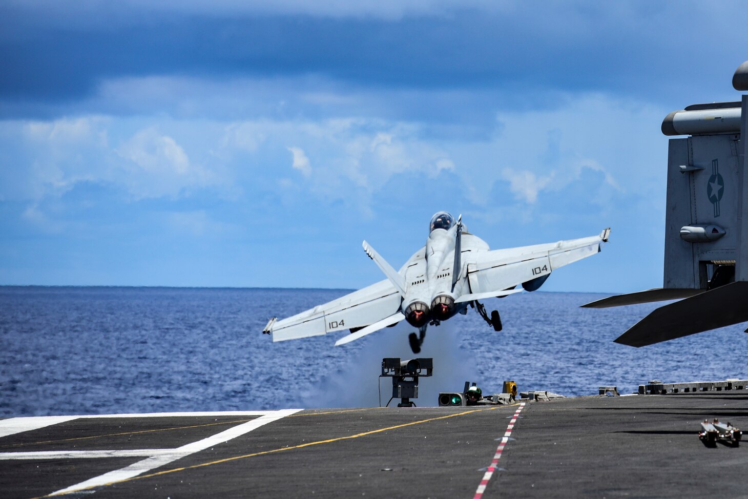 200814-N-RF825-1030 SOUTH CHINA SEA (August 14, 2020) An F/A-18E assigned to the “Diamondbacks” of Strike Fighter Squadron (VFA) 102 launches off the flight deck of America’s only forward-deployed aircraft carrier USS Ronald Reagan (CVN 76)  while conducting operations in the South China Sea. Ronald Reagan, the flagship of Carrier Strike Group 5, provides a combat-ready force that protects and defends the United States, as well the collective maritime interests of its allies and partners in the Indo-Pacific region. (U.S. Navy photo by Mass Communication Specialist 3rd Class Jason Tarleton)