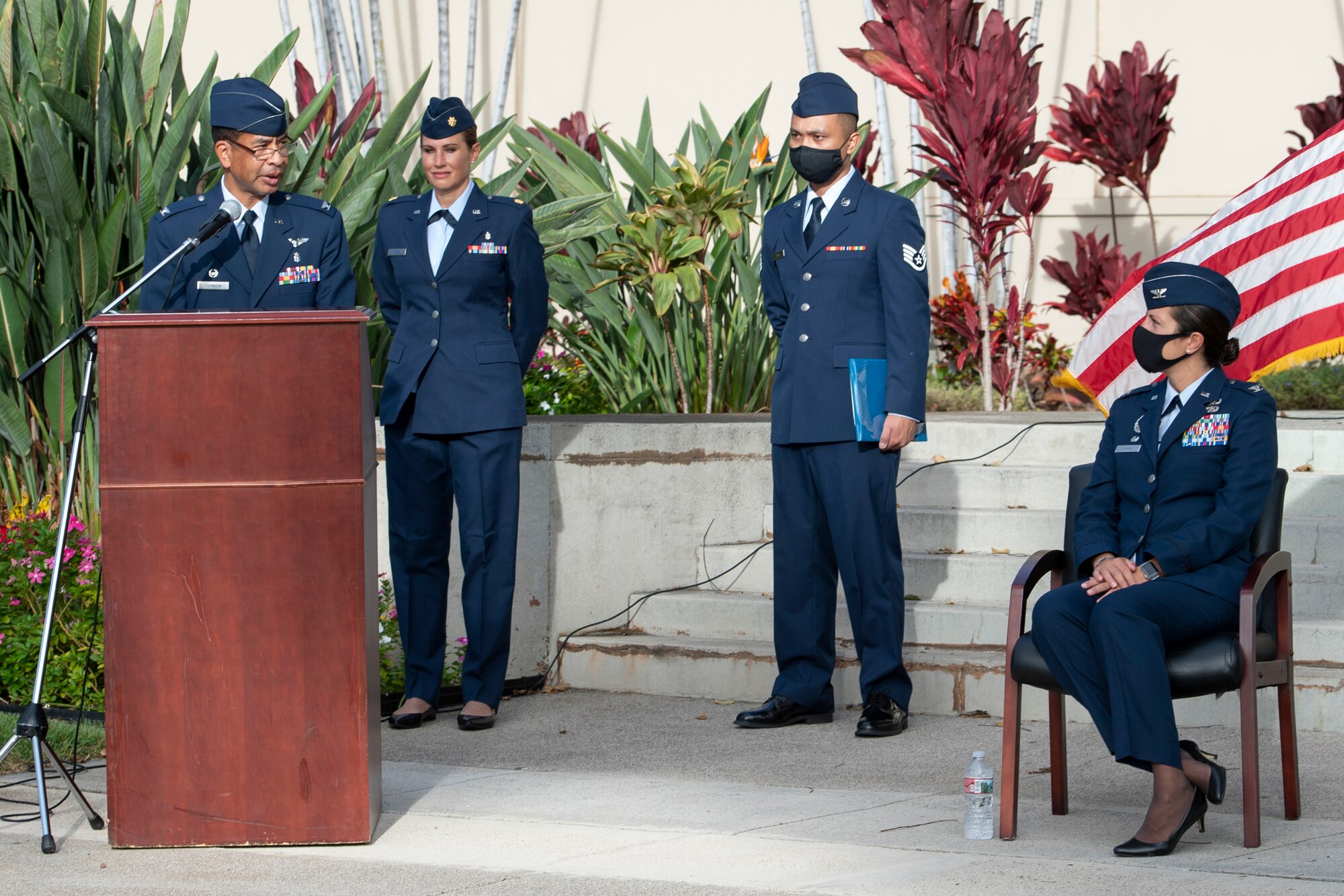 Photo of U.S. Air Force Col. Edward Johnson, 624th Aeromedical Staging Squadron incoming commander, speaking to audience members during the 624th ASTS change of command ceremony in front of the 15th Medical Group building at Joint Base Pearl Harbor-Hickam, Hawaii, Aug. 8, 2020.