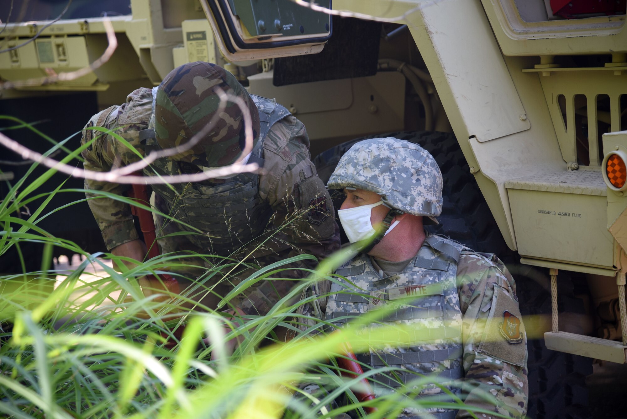 Two Airmen in a convoy