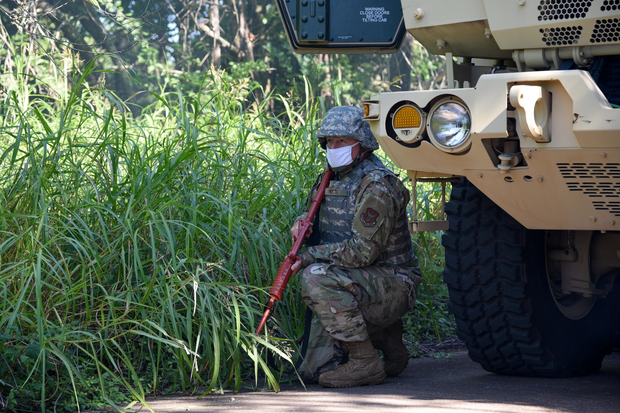 An airman in a convoy