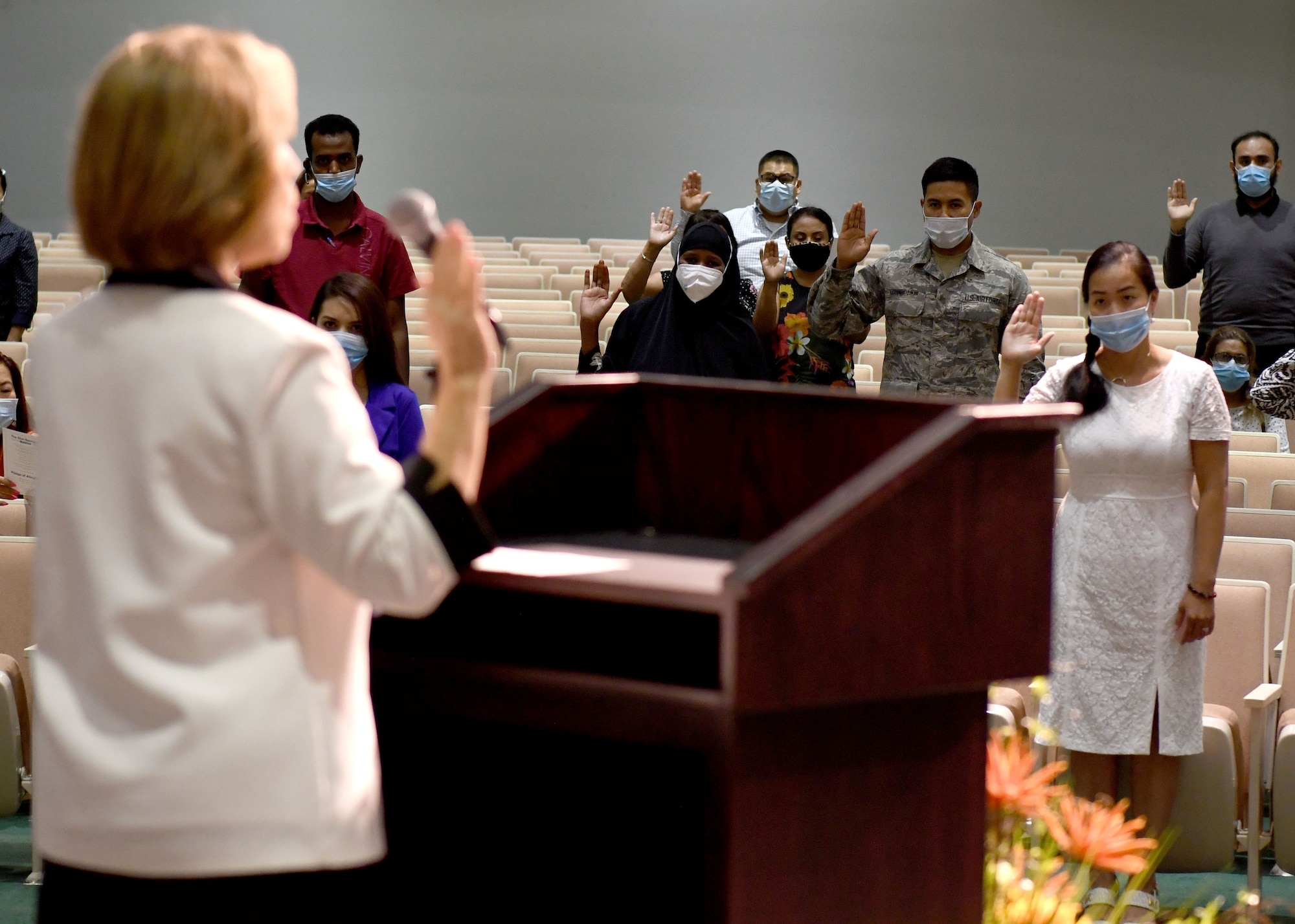 Airman First Class Edgar Barcenas Zumaya, 22nd Civil Engineer Squadron, water and fuel systems maintenance apprentice, recites the Oath of Allegiance during a naturalization ceremony Aug. 7, 2020 at Wichita State University, Wichita, Kansas. Barcenas Zumaya and other service members who are serving or have served in the U.S. armed forces may be eligible to apply for naturalization under special provisions of the Immigration and Nationality Act. (U.S. Air Force photo by Tech. Sgt. Jennifer Stai)