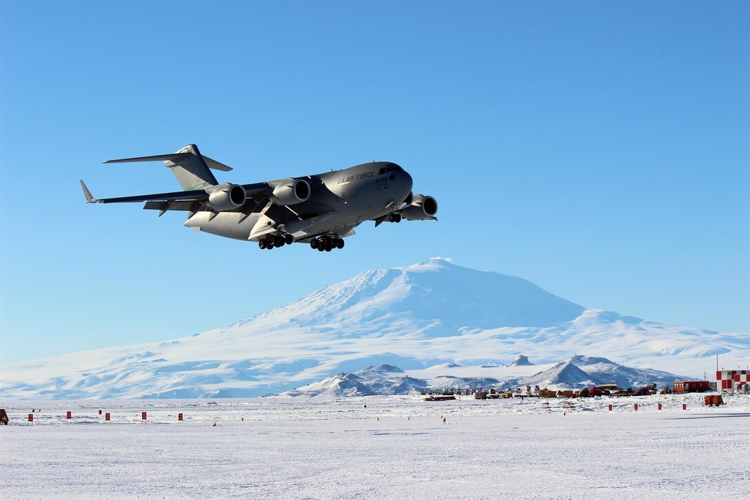 A C-17 Globemaster III from Joint Base Lewis-McChord, Wash., prepares to land at Phoenix Airfield, Antarctica, in this February 2019 file photo. Operation Deep Freeze (ODF) is the only military operation conducted in Antarctica and is carried out in part by Airmen from the 62nd Airlift Wing. (Courtesy photo by Art Gordon)