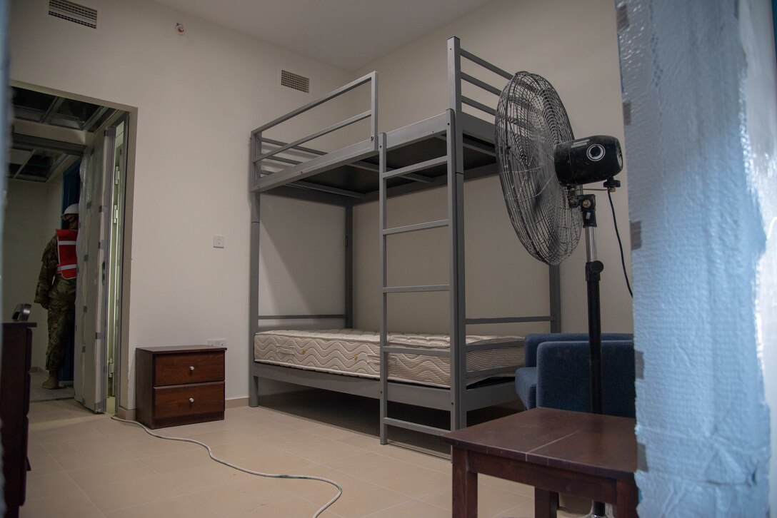 Temporary furniture stands in a newly constructed dorm building to show what life will be like when the building is finished at Al Udeid Air Base, Qatar, Aug. 11, 2020. The construction at Al Udeid is a Qatar-led, funded, and executed project to build 10 state-of-the-art dormitories, two dining facilities, and three mission support facilities slated for completion in the near future in an effort to increase quality of life for the service members at the installation. The 379th Expeditionary Mission Support Group leadership and those involved in this project brought Airmen to the dorm to get feedback on the layout and furniture to ensure it meets their needs.