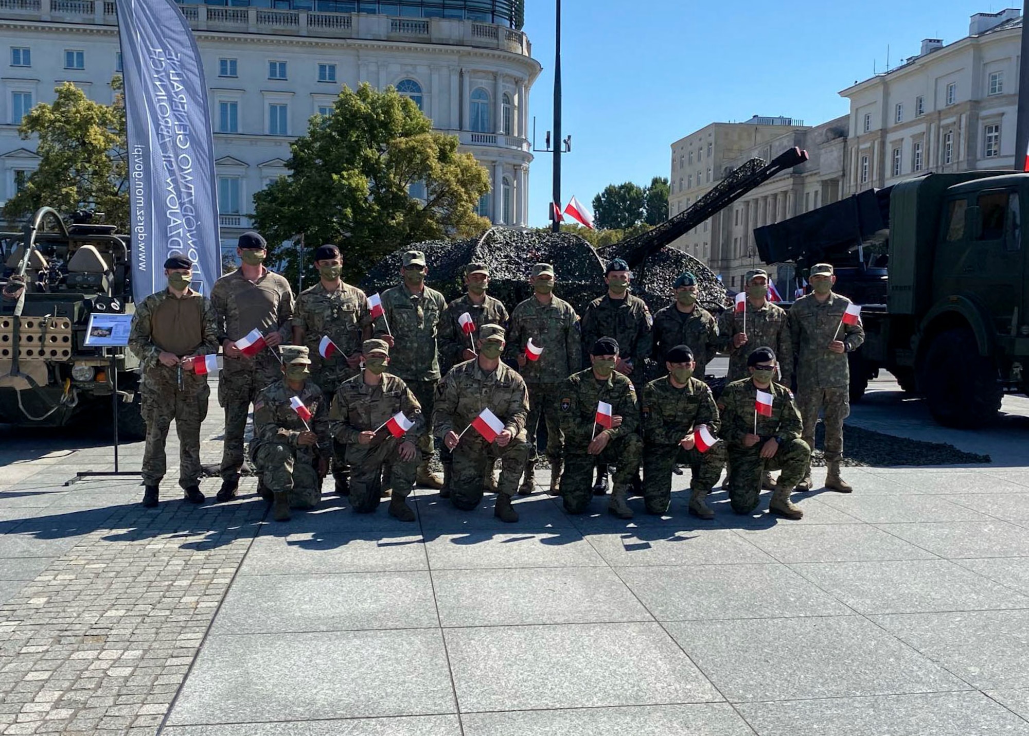 Military members from the United States, Poland, United Kingdom, Romania, and Croatia gather for a group photo during Polish Armed Forces Day at Warsaw, Poland, August 15, 2020. The U.S. military presence in Poland strengthens NATO deterrence and contributes to security in the region. Enhancing that presence would help continue to ensure democracy, freedom and respect for sovereignty. (U.S. Air Force photo by Senior Airman Melody W. Howley)