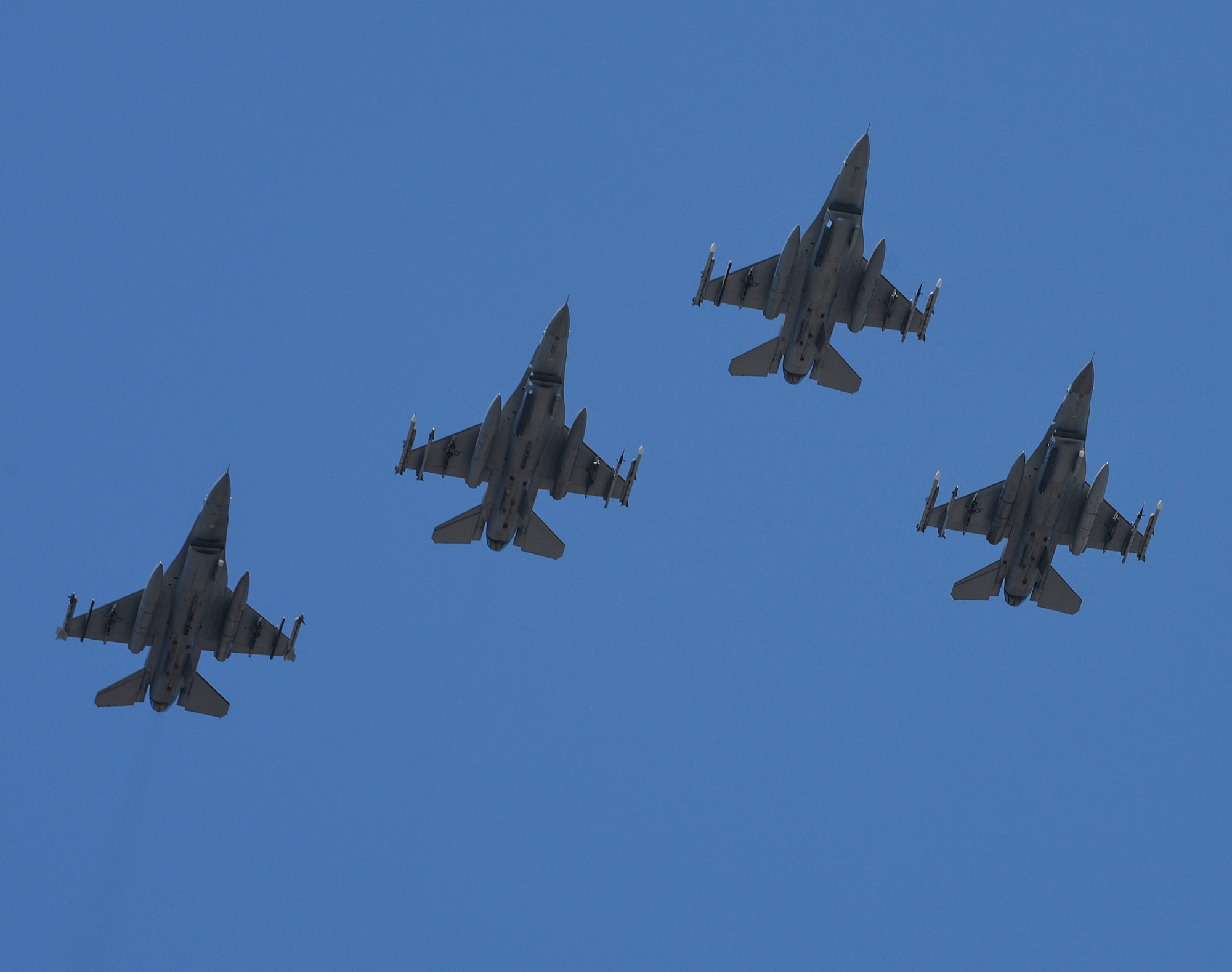 U.S. Air Force F-16 Fighting Falcons, assigned to the 480th Expeditionary Fighter Squadron, participate in Polish Armed Forces Day at Warsaw, Poland, August 15, 2020. The United States was honored to participate in this ceremony with the static display of heavy equipment as well as a flyover of the F-16’s. (U.S. Air Force photo by Senior Airman Melody W. Howley)