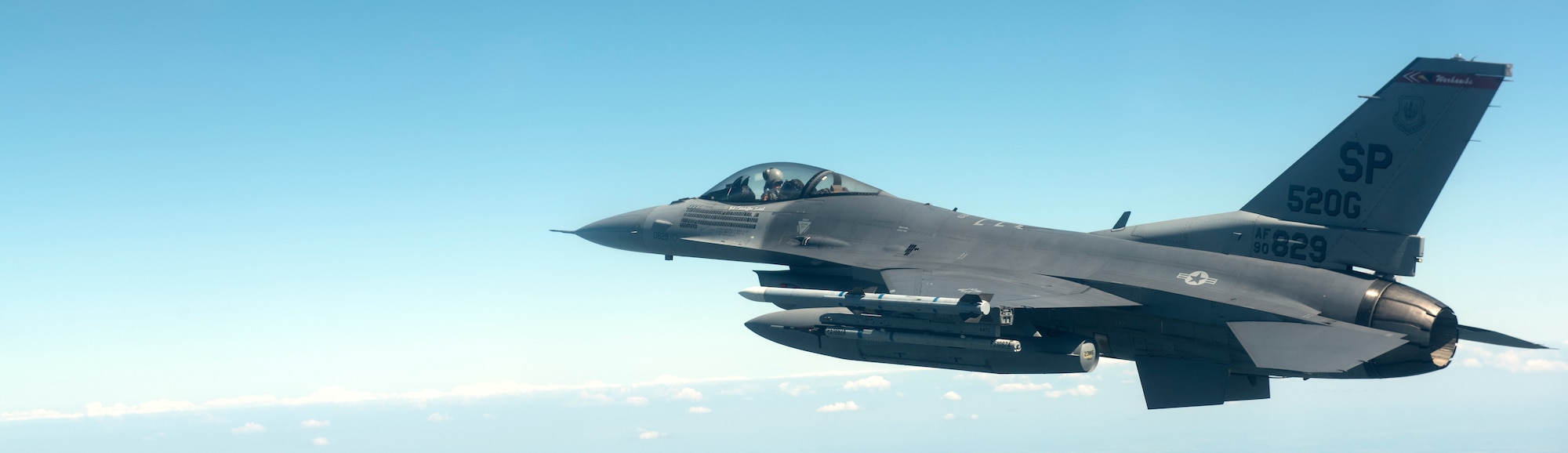 A U.S. Air Force F-16 Fighting Falcon, assigned to the 480th Expeditionary Fighter Squadron, supports Polish Armed Forces Day at Warsaw, Poland, August 15, 2020. The U.S. and Polish partnership is critical in light of growing security challenges, and opportunities to fly and work together help to strengthen this relationship. (U.S. Air Force photo by Senior Airman Chanceler Nardone)