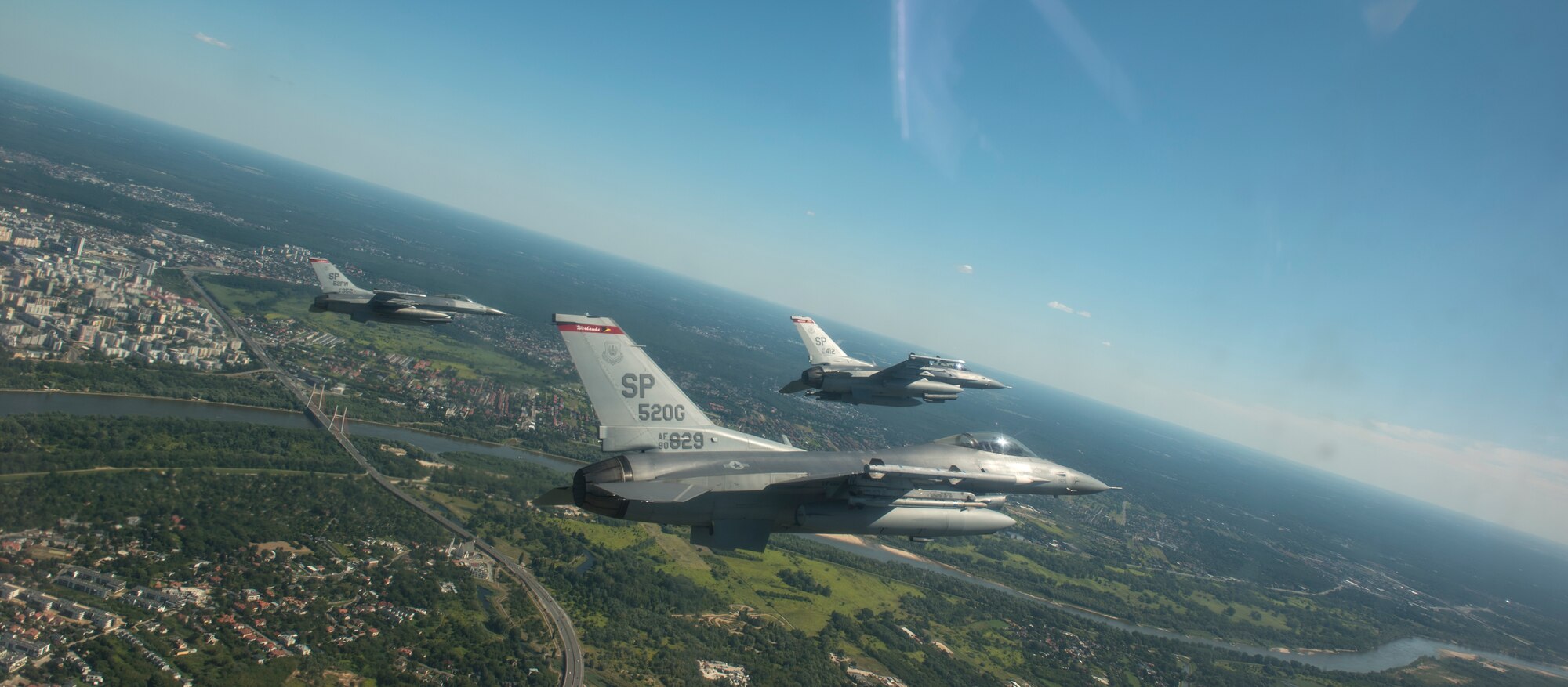 U.S. Air Force F-16 Fighting Falcons, assigned to the 480th Expeditionary Fighter Squadron, participate in a flyover during Polish Armed Forces Day at Warsaw, Poland, August 15,2020.  Participation in the Polish Armed Forces Day is one of several ways the U.S. is continuing to work with Polish allies to strengthen U.S. and Polish defense relations, NATO unity and transatlantic security. (U.S. Air Force photo by Senior Airman Chanceler Nardone)