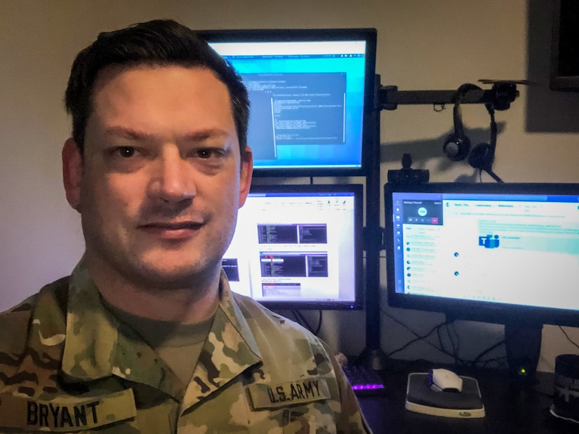 U.S. Army Reserve Lt. Col. Blake Bryant, a cyber officer with Cyber Protection Team 185 poses for a photo during his unit’s Virtual Battle Assembly Aug. 9, 2020.