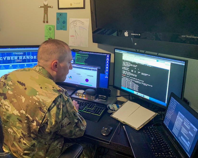 U.S. Army Reserve Maj. Jared Hrabak, a cyber officer with Cyber Protection Team 185 uses a common network scanning tool “masscan” to enumerate a network