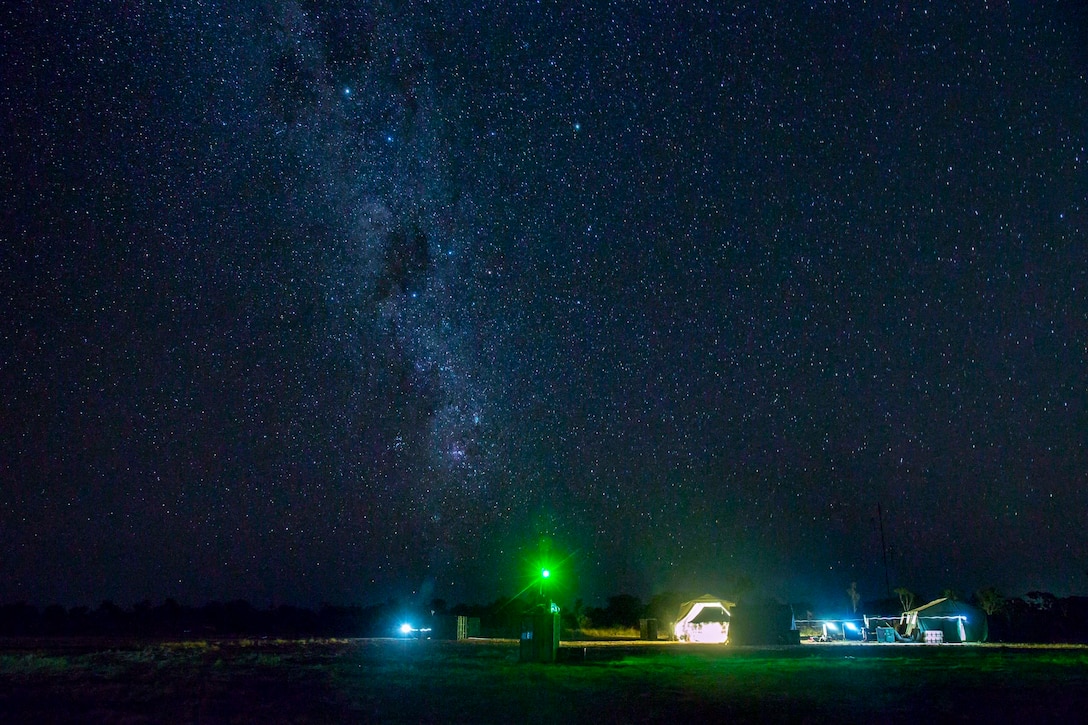 U.S. Marines return the RQ-21A Blackjack to the maintenance tent at Bradshaw Field Training Area, Australia, Aug. 13.