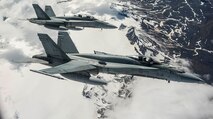 Photo of two Royal Canadian Air Force C-18s in flight.