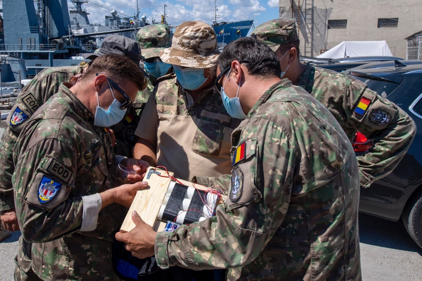 200803-N-RH019-0014 CONSTANTA, Romania, (Aug. 3, 2020) Romanian Navy Explosive Ordinance Disposal technicians, with unit 175, inspect an improvised explosive device training aid during Eurasian Partnership Mine Countermeasures (EP MCM) 2020 exercise, August 3, 2020. This practical exercise was to help them identify… EP MCM is a multi-lateral engagement with U.S., Romania and Bulgaria focused on enhancing mine countermeasure operations in the Black Sea and promoting interoperability. EP MCM is a multi-lateral engagement with U.S., Romanian and Bulgarian forces, focused on enhancing mine countermeasure operations in the Black Sea, while strengthening interoperability between allied forces. U.S. 6th Fleet, headquartered in Naples, Italy, conducts the full spectrum of joint and naval operations, often in concert with allied, joint, and interagency partners, in order to advance U.S. national interests and security and stability in Europe and Africa. (U.S. Navy photo by Mass Communication Specialist 2nd Class Sean Rinner)