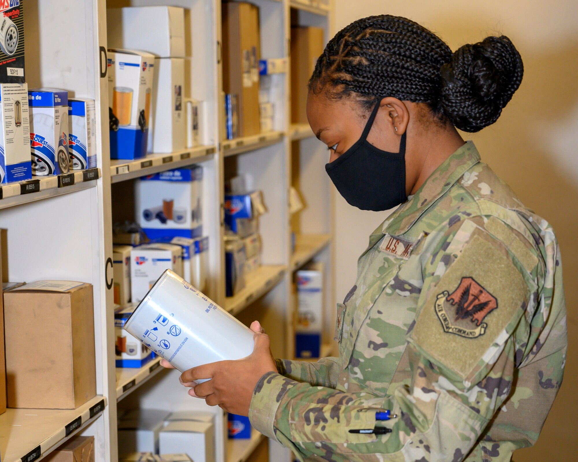 An Airman inspects vehicle management’s parts inventory.