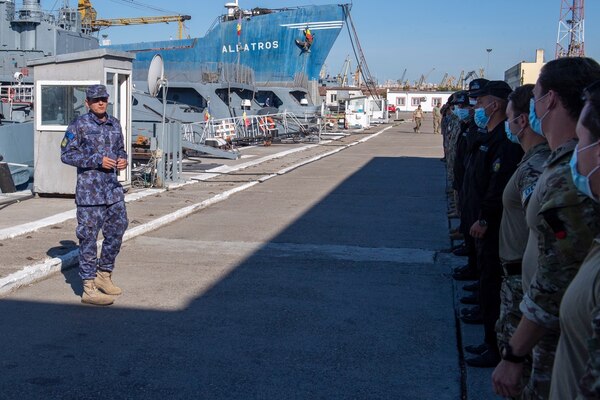 200803-N-RH019-0002 CONSTANTA, Romania, (Aug. 3, 2020) Denis Dolceanu, chief of staff, Romanian Navy Diving Center, addresses the Explosive Ordinance Disposal teams during opening remarks for exercise Eurasian Partnership Mine Countermeasures (EP MCM) 2020, August 3, 2020. EPMCM is a multi-lateral engagement with U.S., Romanian and Bulgarian forces, focused on enhancing mine countermeasure operations in the Black Sea, while strengthening interoperability between allied forces. U.S. 6th Fleet, headquartered in Naples, Italy, conducts the full spectrum of joint and naval operations, often in concert with allied, joint, and interagency partners, in order to advance U.S. national interests and security and stability in Europe and Africa. (U.S. Navy photo by Mass Communication Specialist 2nd Class Sean Rinner)