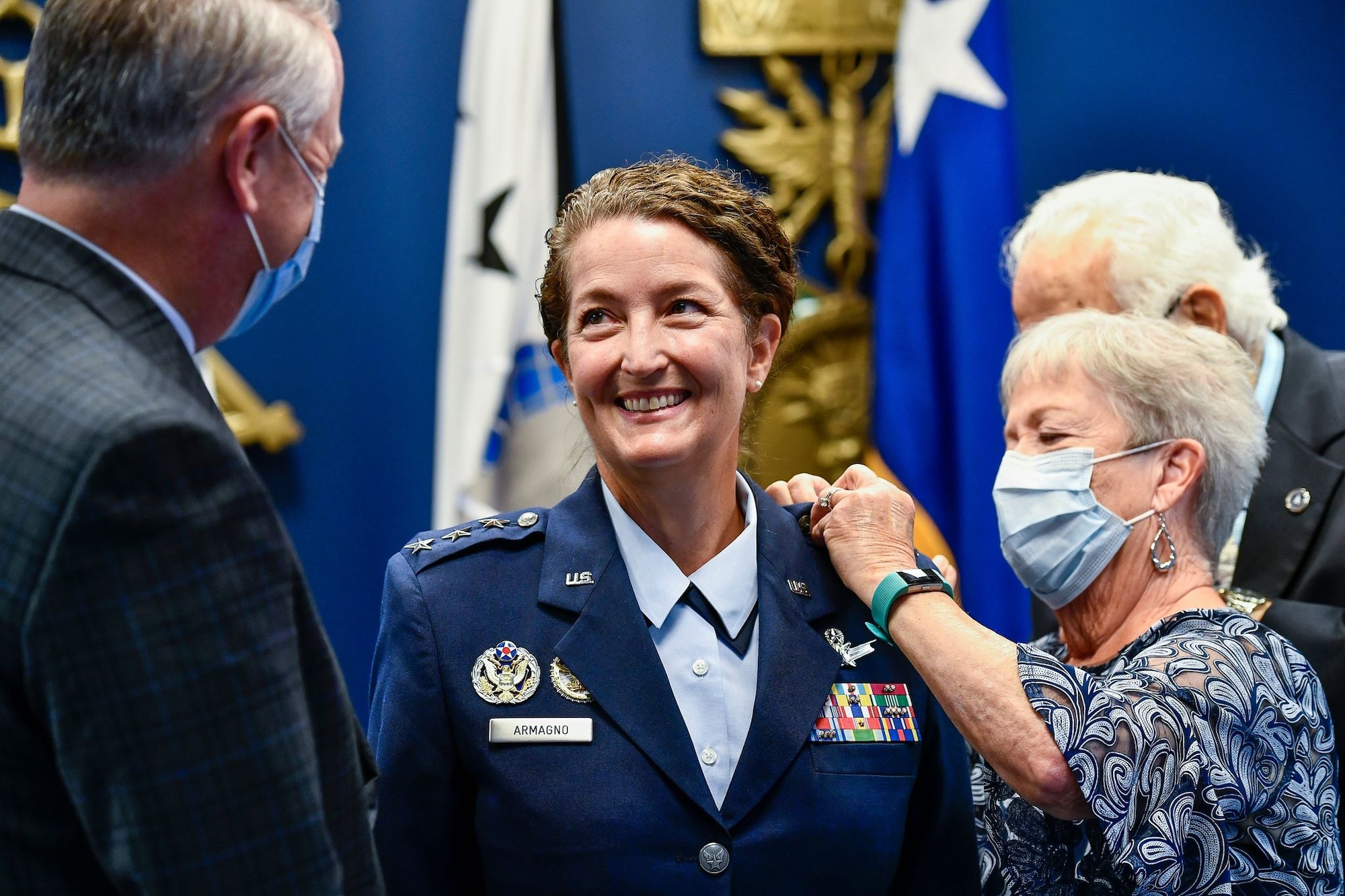 Lt. Gen. Nina M. Armagno has her new rank pinned on by her family during her promotion ceremony at the Pentagon, Arlington, Va., Aug. 17, 2020. Armagno transferred from the Air Force to Space Force during the ceremony. (U.S Air Force photo by Eric Dietrich)