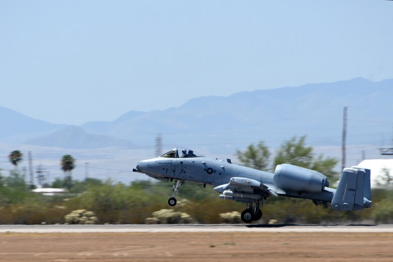 a photo of an A-10 taking off