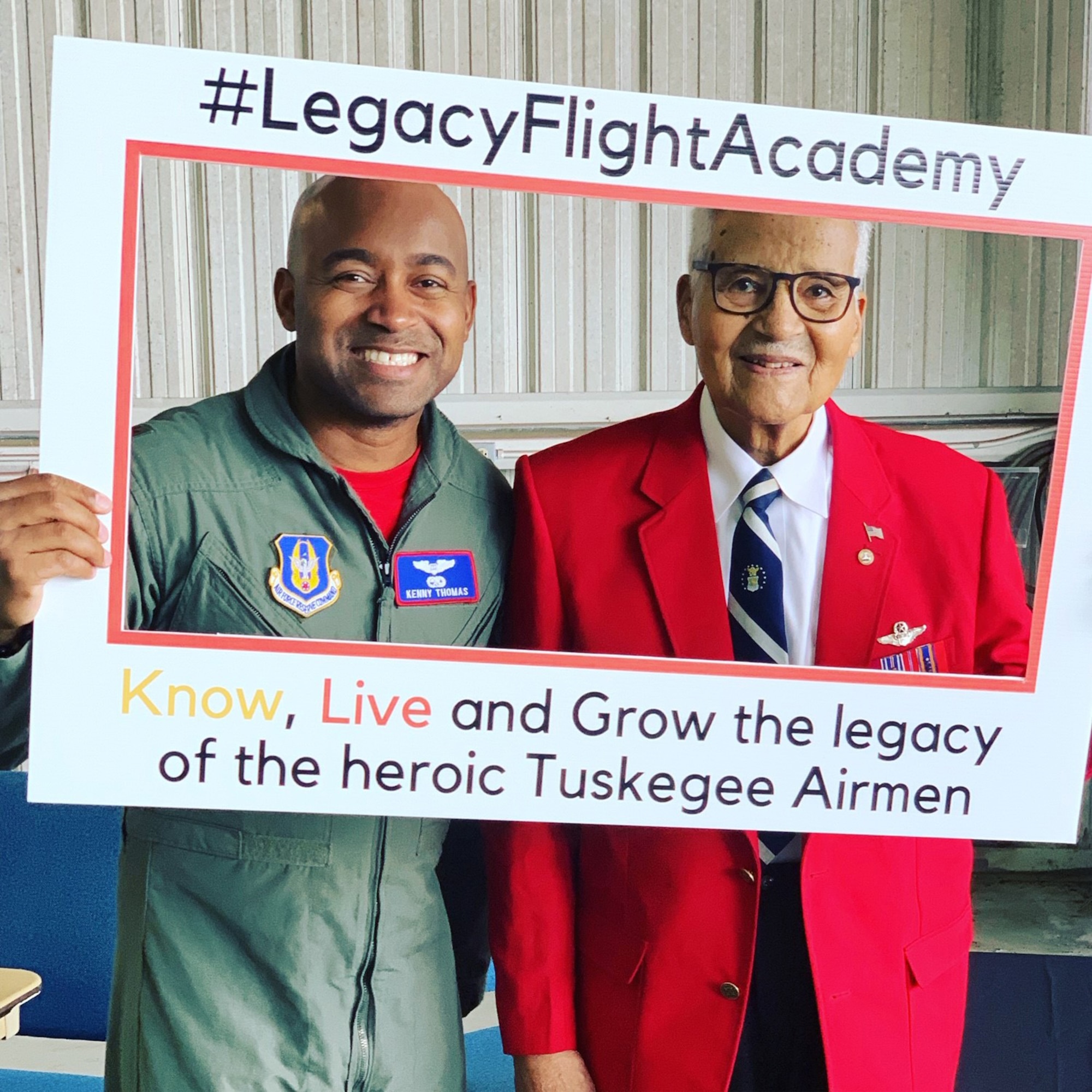 Brig. Gen. Charles McGee, an original Tuskegee Airmen, poses with Maj. Kenneth Thomas, a navigator with the 94th Airlift Wing, Dobbins Air Reserve Base, Georgia, at a Legacy Flight Academy event.