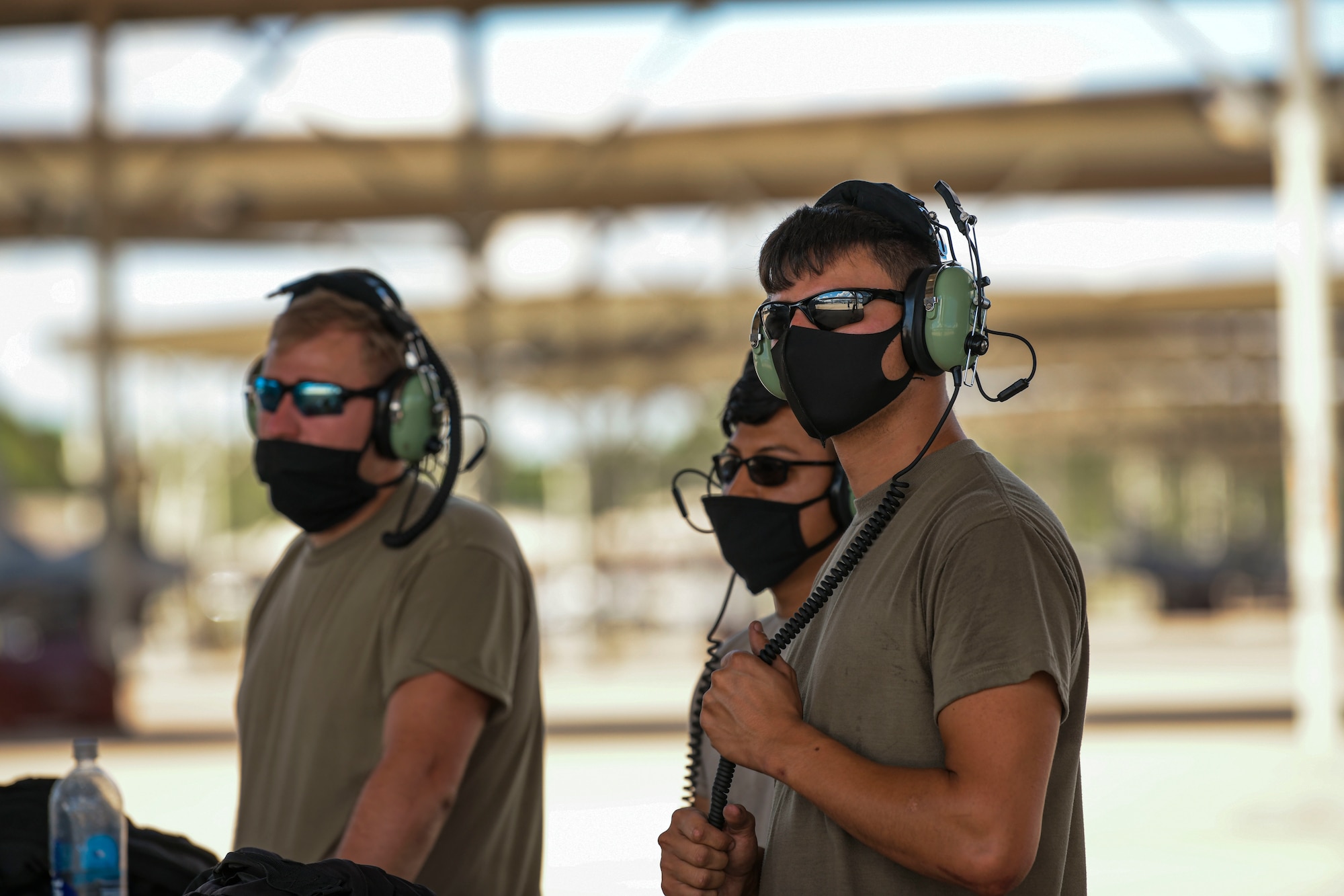 Airmen on flightline.