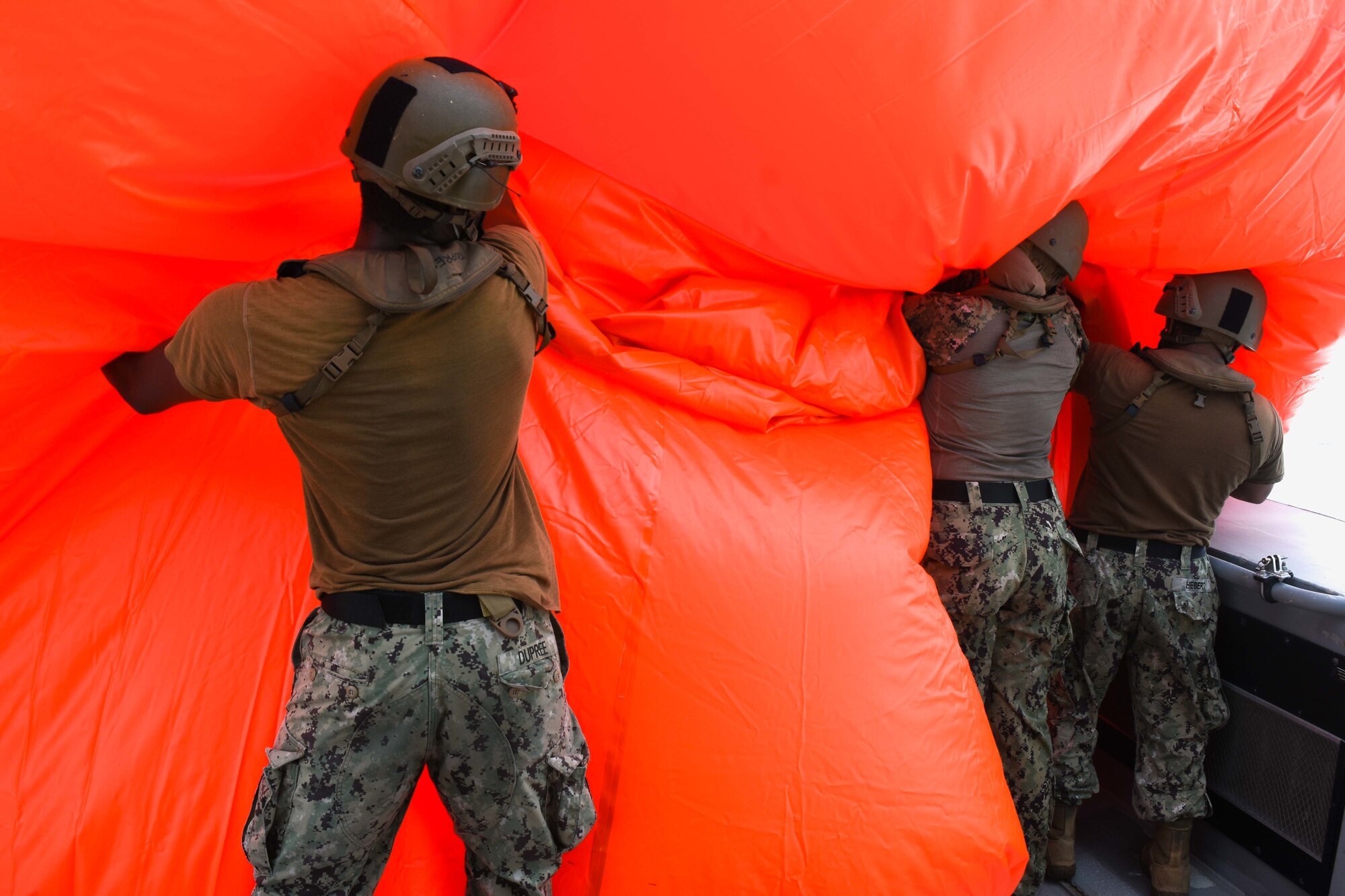 Sailors assigned to Commander, Task Force (CTF) 56, cast an inflatable target off a Mark VI patrol craft during an air operations in support of maritime surface warfare exercise with United Arab Emirates Joint Aviation Command forces in the Arabian Gulf Aug. 11, 2020. Integration operations between UAE and U.S. maritime forces are regularly held to maintain interoperability and the capability to counter threats posed in the maritime domain, ensuring freedom of navigation and free flow of commerce throughout the region’s heavily trafficked waterways. (U.S. Army photo by Staff Sgt. Timothy Clegg)