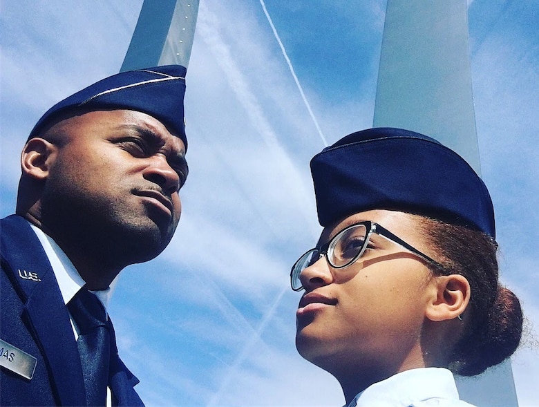 Maj. Kenneth Thomas, a navigator with the 94th Airlift Wing, Dobbins Air Reserve Base, Georgia, and his daughter, Dominica Thomas, a Civil Air Patrol cadet, pose for a photo at the Air Force Memorial in Washington D.C. in 2017.