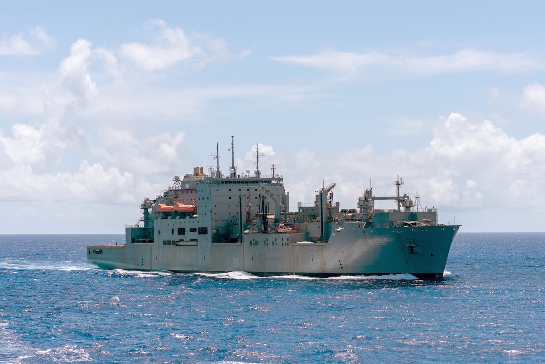 USNS Alan Shepard (T-AKE 3) breaks away from the Arleigh Burke-class guided-missile destroyer USS Halsey (DDG 97) after a replenishment-at-sea.