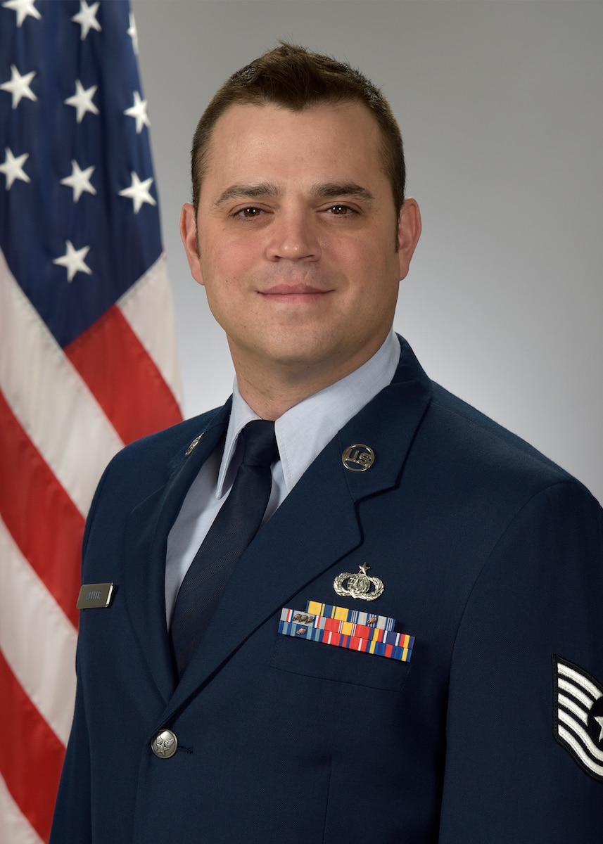 Official Photo of TSgt Gerald Welker, hornist with Academy Winds and Concert Band, two of nine ensembles in the United States Air Force Academy Band, Peterson AFB, CO.