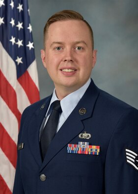 Official Photo of SSgt Jared Andrews, bassist with the Falconaires and Concert Band, two of nine ensembles in the United States Air Force Academy Band, Peterson AFB, CO.