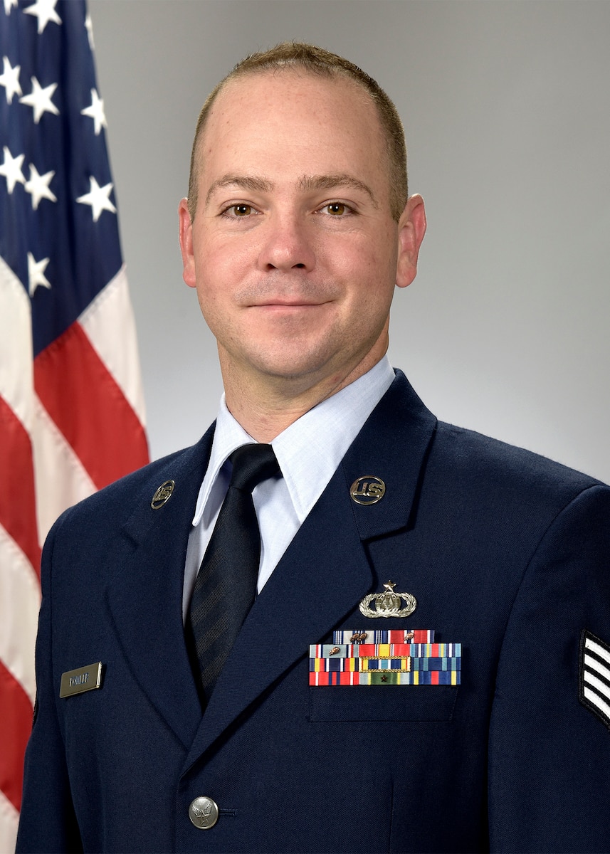 Official photo of SSgt Andrew Fowler, trumpeter with the Falconaires and Concert Band, two of nine ensembles in the United States Air Force Academy Band, Peterson AFB, CO.