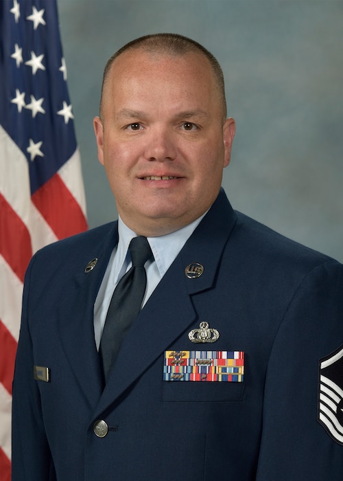 Official photo of MSgt Christopher Hammiel, trumpeter with the Falconaires and Concert Band, two of nine ensembles in the United States Air Force Academy Band, Peterson AFB, CO.