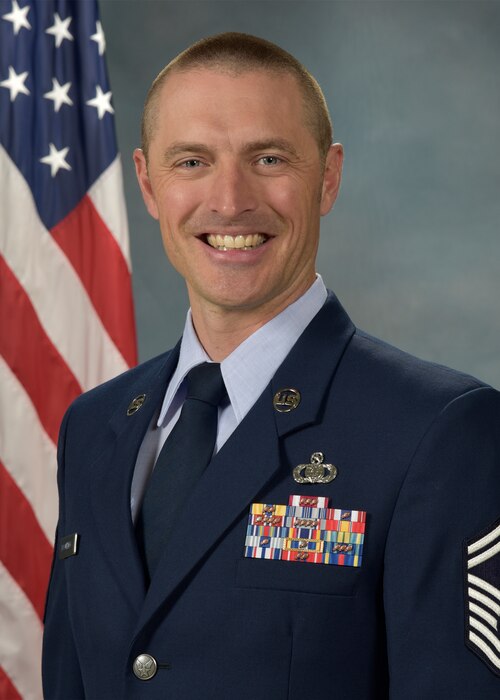 Official photo of SMSgt David McCormick, trombonist with the Falconaires and Concert Band, two of nine ensembles in the United States Air Force Academy Band, Peterson AFB, CO.