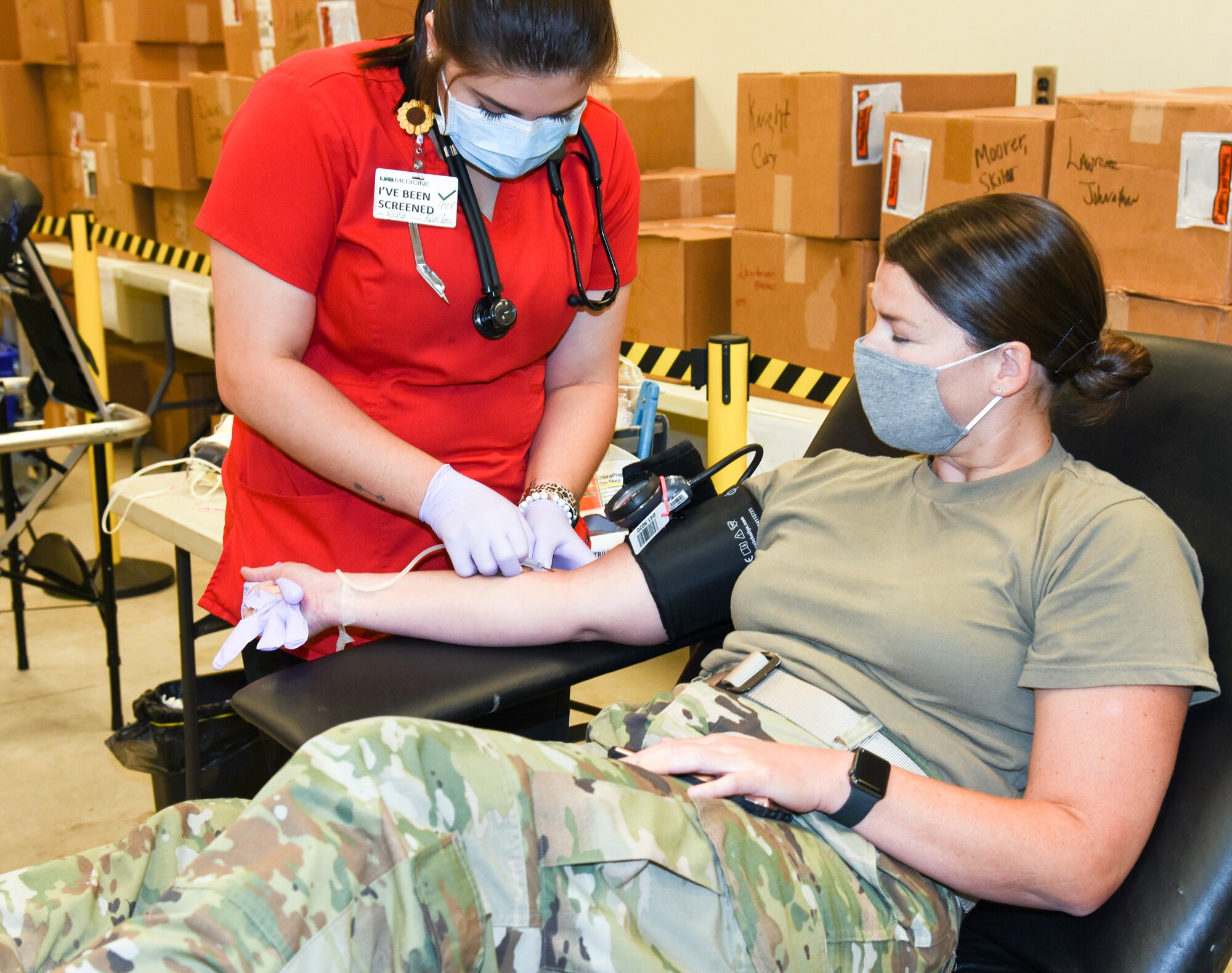 Members of the 117th Air Refueling Wing participate in a blood drive on Aug. 14, 2020 at Sumpter Smith JNGB, Ala. 
The donated blood went to local blood banks and will be used for conventional purposes like blood transfusions but extra vials of blood were taken to test for COVID-19 antibodies. Angelita Robinson, collection specialist II for the American Red Cross, explained that she’s done thousands of blood drives in her 20 years with AMCROSS but testing for COVID-19 antibodies is a new step they have added.
	“It's to check to see if a donor has the antibody,” Robinson said. “If a donor recovered from the Coronavirus they would have antibodies still in their blood systems.” 
According to Robinson, having the antibodies in the bloodstream doesn’t mean a person currently has COVID-19. 
“Any time a person has an illness or condition certain antibodies are built up in the blood,” she said. “A person who does have the antibodies will be wanted to donate plasma so they can develop some kind of vaccine.” 
A donated unit of blood will be put in extra vials that go to a lab. Tests are conducted in labs using a plasma process for the antibodies which can be used in a vaccine. Even without testing of antibodies donated blood can help save a life.
“We still need blood for patients that are in the hospital like accident victims or people who need transfusions for surgeries,” Robinson said.