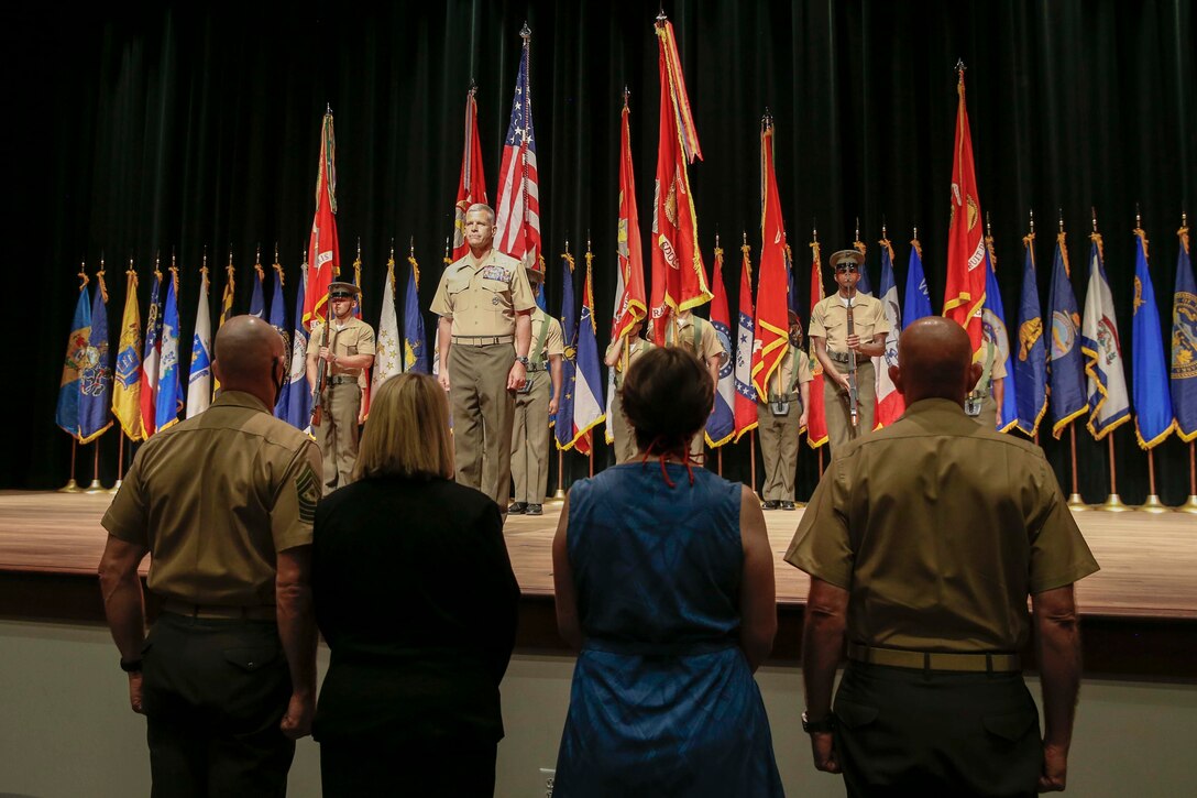 The 19th Sergeant Major of the Marine Corps, Sgt. Maj. Troy E. Black stands at attention for honors to the oncoming Training and Education Command (TECOM) Commander, Lt. Gen. Lewis Craparotta, during change of command ceremony at Marine Corps Base Quantico, Quantico, V.A., Aug. 3, 2020. The change of command transitioned TECOM from a two-star command to a three-star command. The change supports the Commandant’s Planning Guidance, as Gen. Berger’s intent to change the Service Level Training and Education from an Industrial Age model to an Information age model to better serve Marines and units for future operating environments. (U.S. Marine Corps photo by Sgt. Victoria Ross)