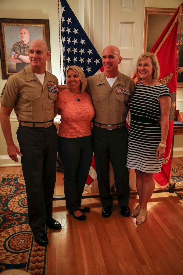 The 19th Sergeant Major of the Marine Corps, Sgt. Maj. Troy E. Black stands for a photo at  Maj. Gen. David A. Ottignon’s appointment to Lieutenant General and assumption of the office of Deputy Commandant for Manpower and Reserve Affairs (M&RA) at Marine Barracks Washington, Washington D.C., Aug. 4 2020. The appointment transferred the authorities from Lt. Gen. Michael A. Rocco to Lt. Gen. Ottignon. The M&RA Department assists the Commandant by planning, directing, coordinating, and supervising both active and reserve forces. (U.S. Marine Corps photo by Sgt. Victoria Ross)