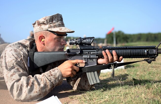 Recruit Austin Ferrell with Kilo Company, 3rd Recruit Training Battalion fires his M16A4 Service Rifle during the Table One course of fire on Marine Corps Recruit Depot, Parris Island S.C. July 30, 2020. Farrell broke the depot record for Table One rifle qualification score with a total score of 248 out of 250. (U.S. Marine Corps photo by Cpl. Shane Manson)