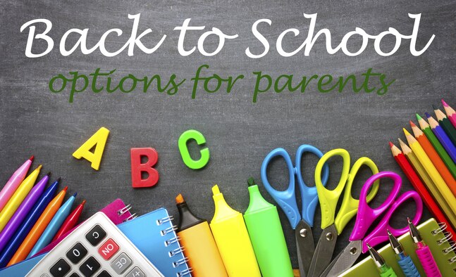 School supplies on blackboard background