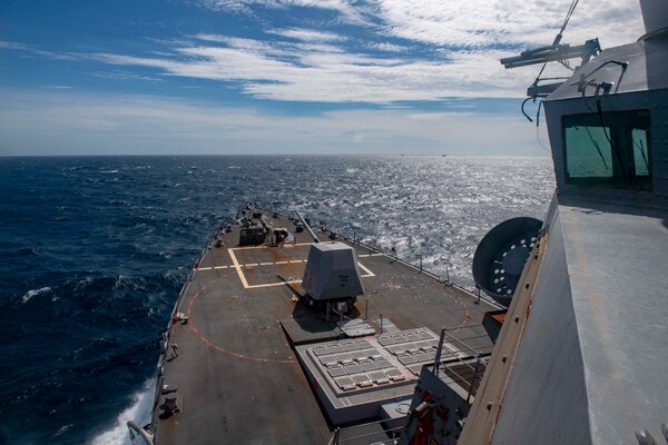 The Arleigh Burke-class guided-missile destroyer USS Mustin (DDG 89) conducts routine operations in the East China Sea.