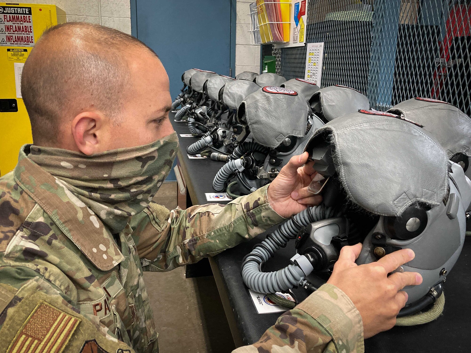 Master Sgt. Rudolph Panacci, 301st Fighter Wing aircrew flight equipment technician, performs a pre-flight visual inspection of the PD-14 display module for the Hybrid Optical based Inertial Tracking system (HObIT) at U.S. Naval Air Station Joint Reserve Base Fort Worth, Texas on August 5, 2020. The 301 FW AFE section's mission is to provide aircrew members with safe and effective flight equipment to increase performance and enhance mission success. (Courtesy photo)