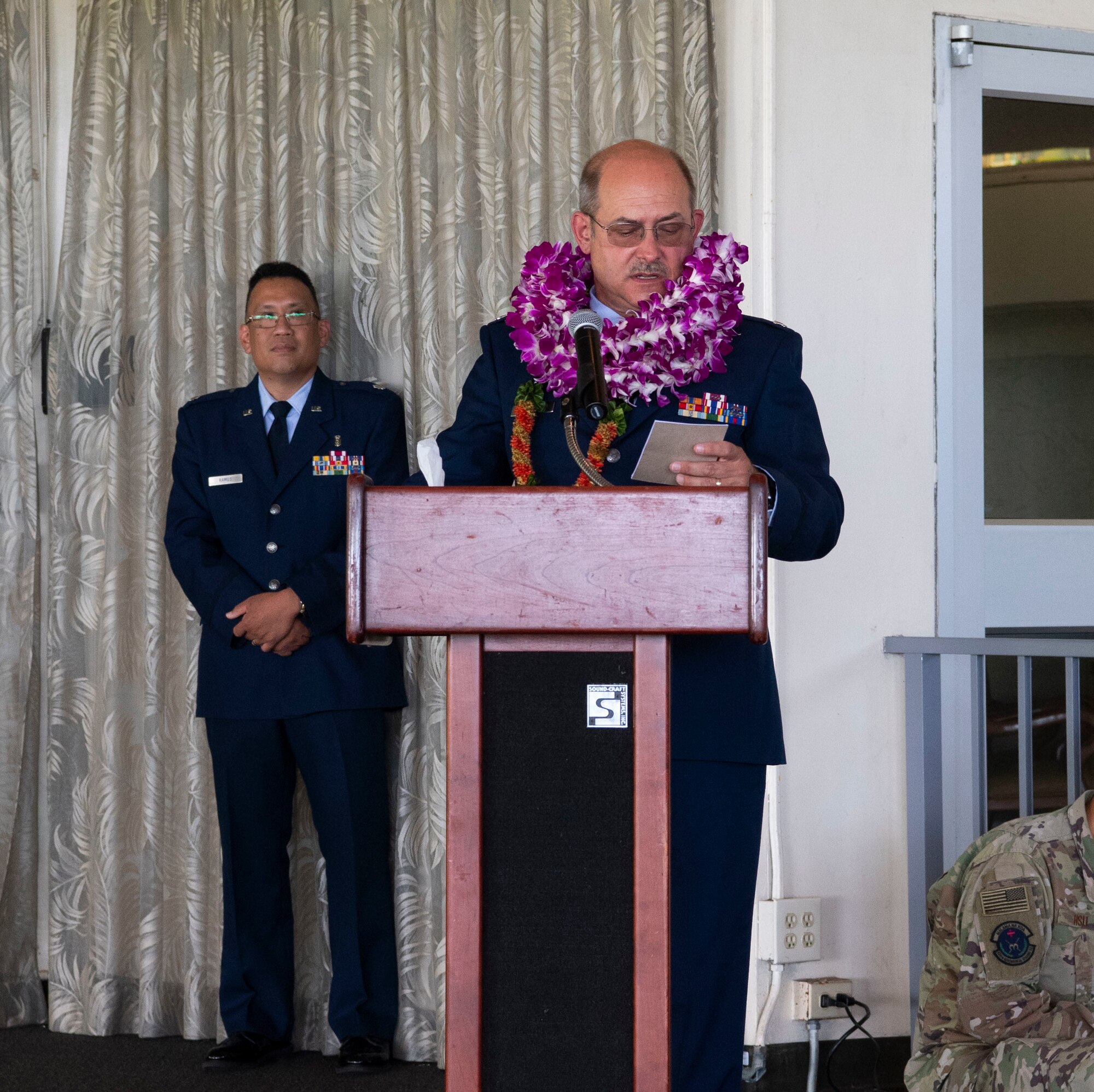 A photo of U.S. Air Force Col. Lee Bradshaw, the former commander of the 624th Aeromedical Staging Squadron, addressing the unit for the last time during his retirement ceremony at Joint Base Pearl Harbor-Hickam, Hawaii, Aug. 9, 2020.
