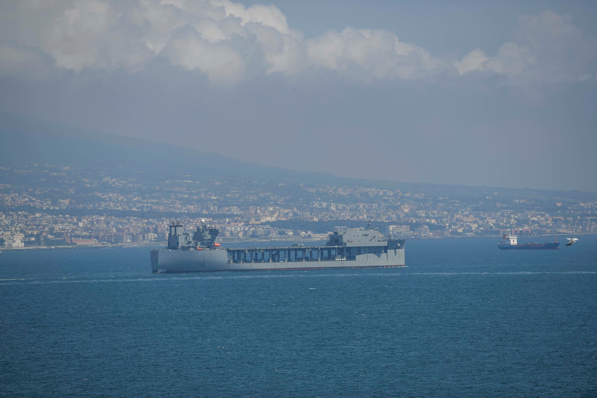 The Lewis B. Puller-class expeditionary sea base USS Hershel "Woody" Williams (ESB 4) departs Porto Napoli for its inaugural deployment in the U.S. 6th Fleet area of operations after stopping for fuel and supplies, Aug. 15, 2020.
