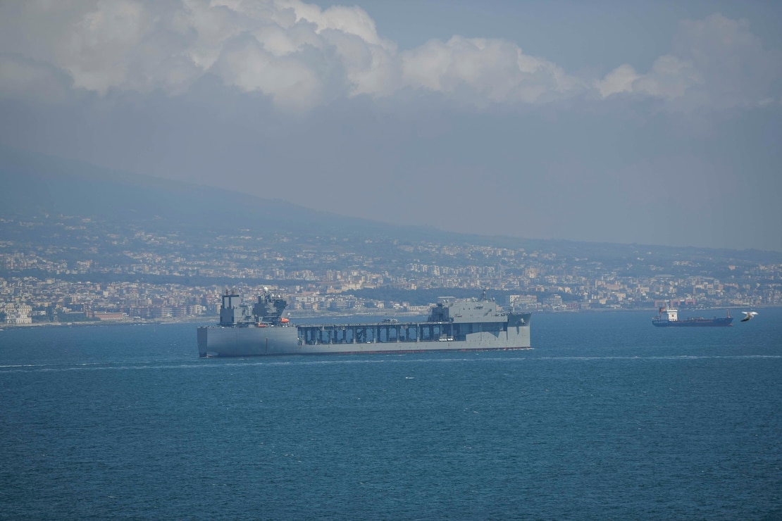 The Lewis B. Puller-class expeditionary sea base USS Hershel "Woody" Williams (ESB 4) departs Porto Napoli for its inaugural deployment in the U.S. 6th Fleet area of operations after stopping for fuel and supplies, Aug. 15, 2020.