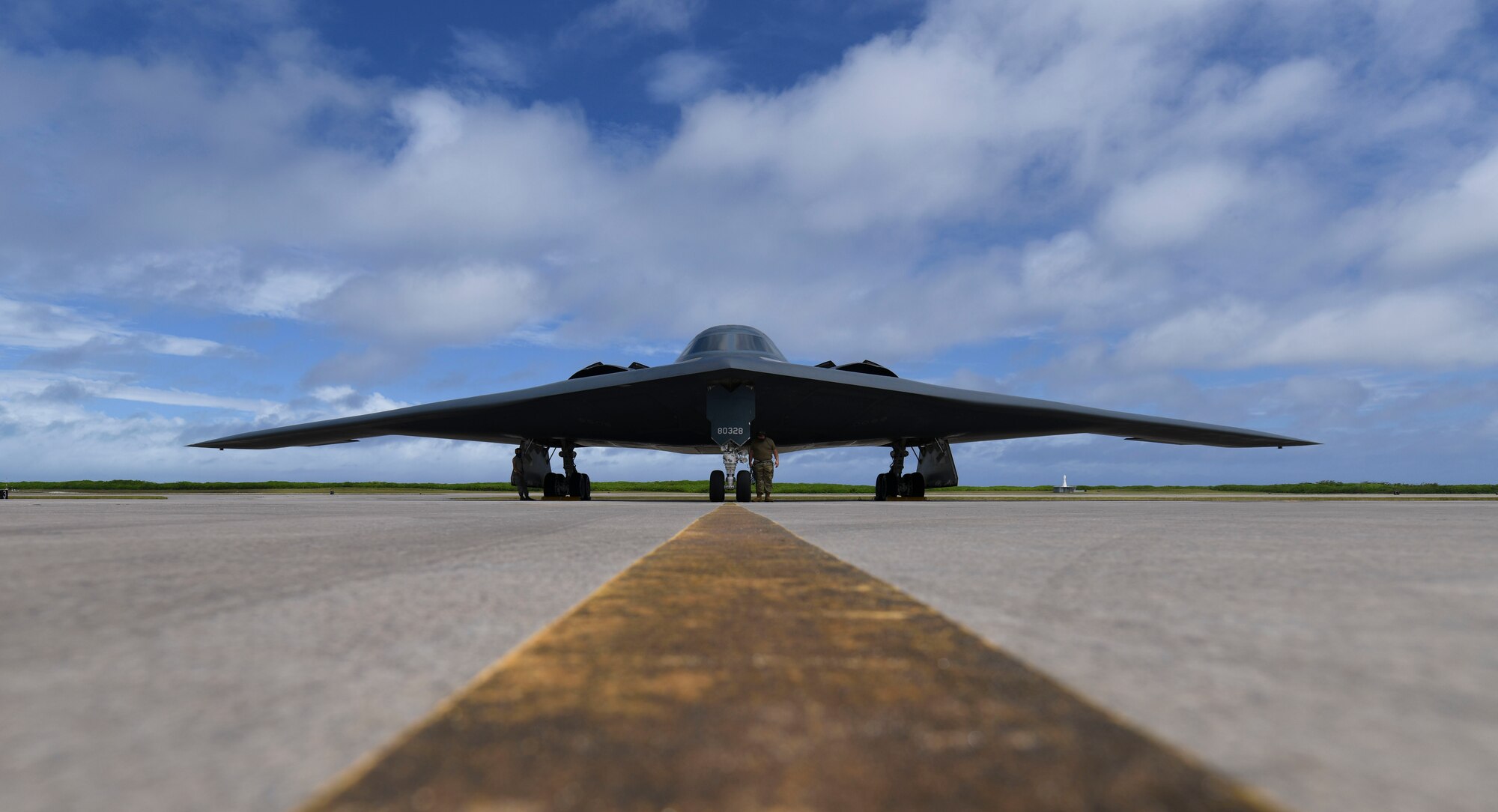 U.S. Air Force Senior Airman Robert Witkowski and Staff Sgt. Mark Farrar, 393rd Expeditionary Bomb Squadron crew chiefs, deployed from Whiteman Air Force Base, Missouri, prepare a B-2 Spirit Stealth Bomber for take-off at Naval Support Facility Diego Garcia, to support a Bomber Task Force mission,  Aug. 17, 2020. Bomber Task Force missions allow U.S. Strategic Command to provide persistent, long-term bomber presence in the Indo-Pacific, and around the globe. Over the course of 24 hours, four B-1B Lancers, two B-2 Spirit Stealth Bombers, and four F-15C Eagles conducted Bomber Task Force missions simultaneously within the Indo-Pacific region. Pacific Air Forces routinely conducts BTF operations to show the United States’ commitment to allies and partners in the Indo-Pacific area of responsibility. (U.S. Air Force photo by Tech. Sgt. Heather Salazar)